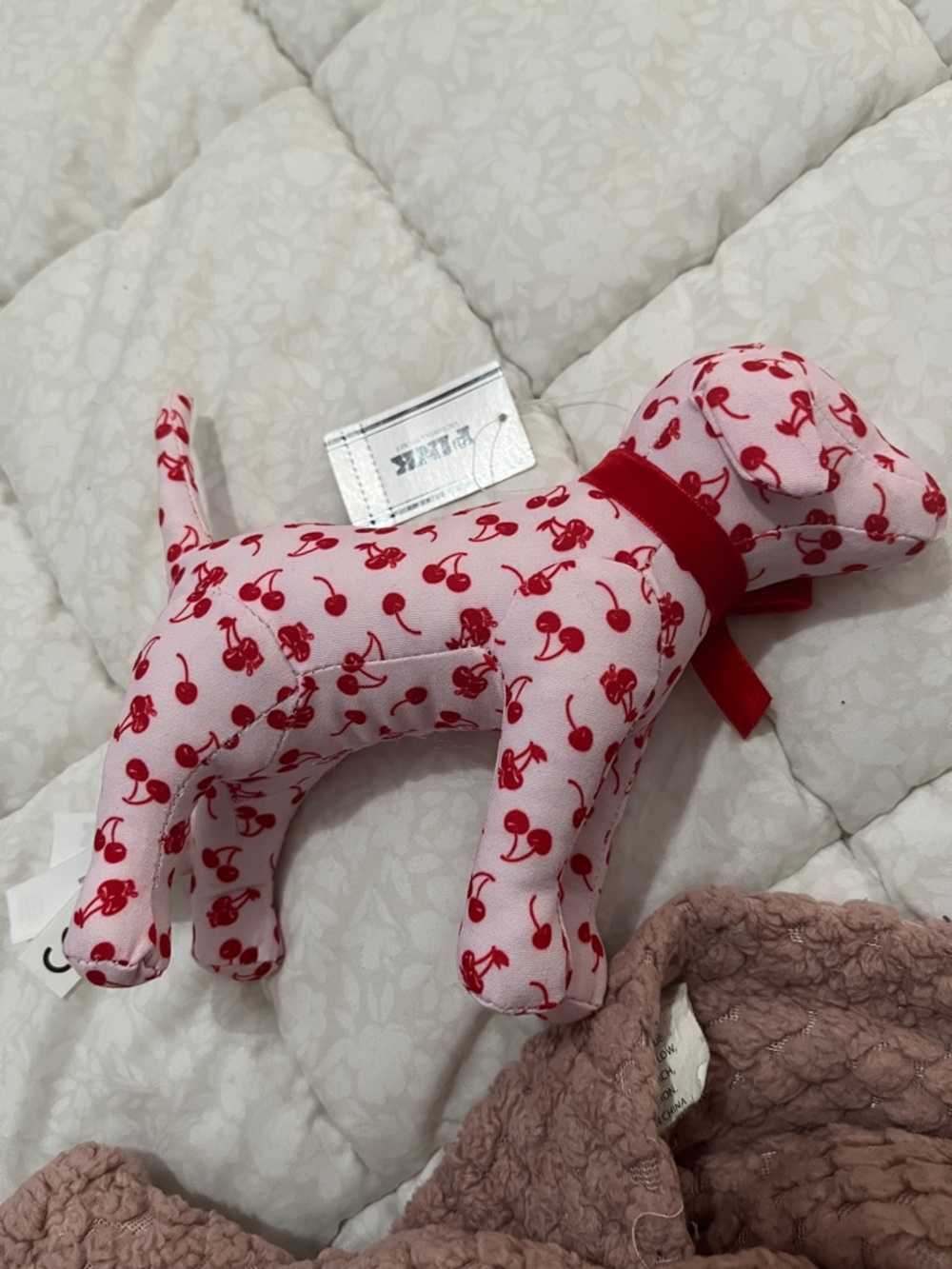 Victoria's Secret Pink Plush Dog Toy with Red Cherry Print and Red Ribbon